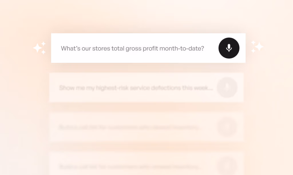 Search bar UI showing the question &ldquo;What&rsquo;s our store&rsquo;s total gross profit month-to-date?&rdquo; with a microphone button, over a soft warm gradient background.